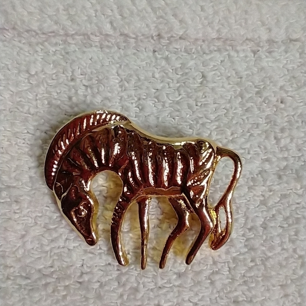 Goldtone zebra animal African brooch